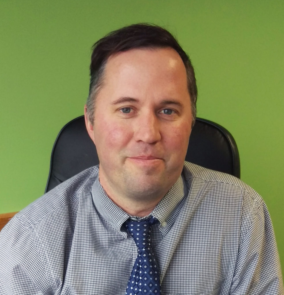 Photo of Drew Warren, Director of Residential Services at Triangle