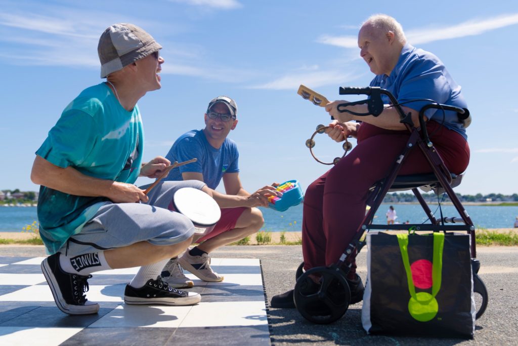 Triangle residents and friends enjoy the sun and music at our annual Beach:Ability event.