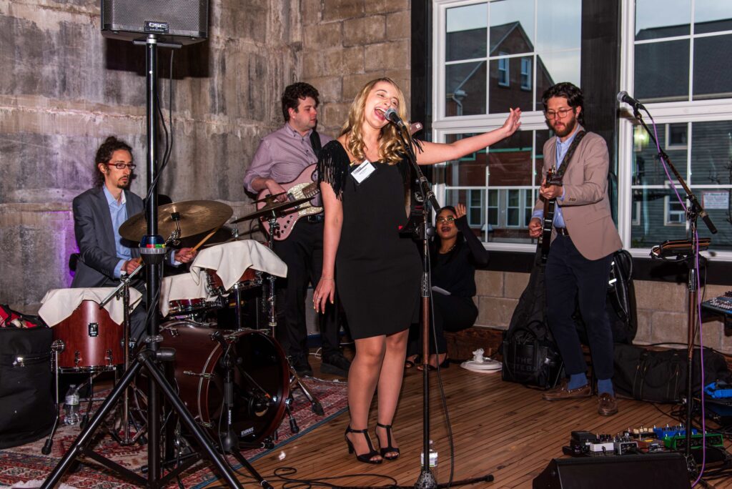 A group of musicians plays at our Celebration